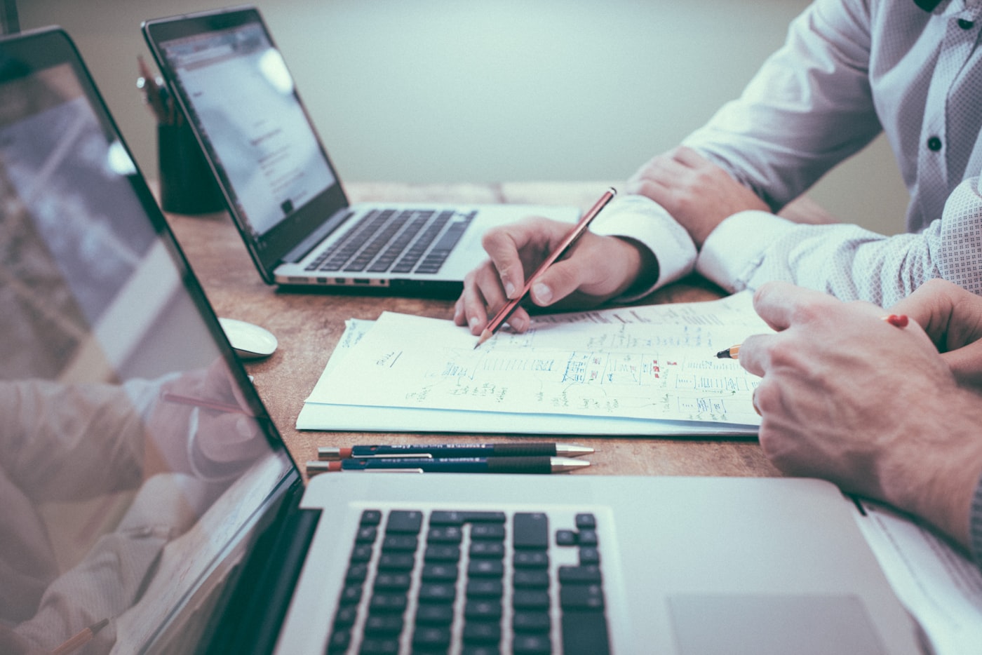 Professional reviewing documents related to disability benefits